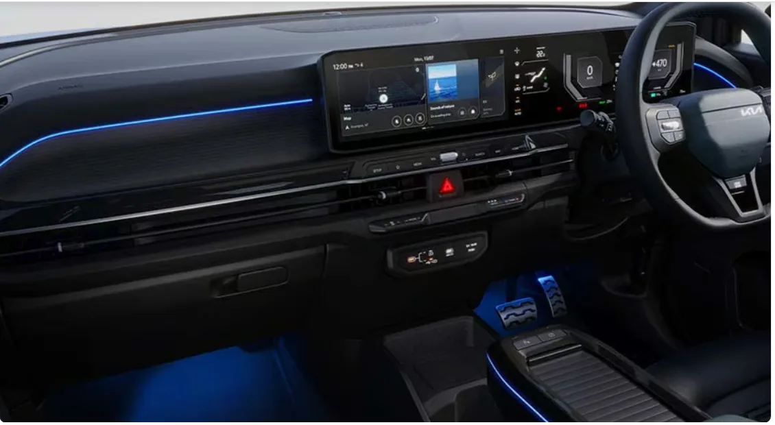 Kia Syros EV offers a premium and technology-focused cabin with a clean dashboard layout and high-quality materials.