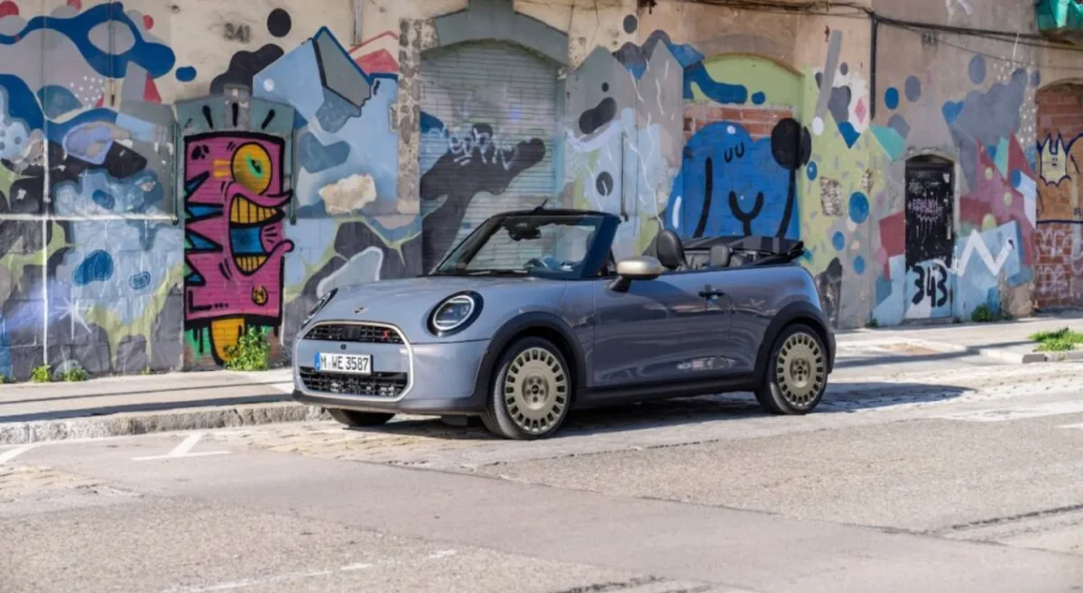The MINI Convertible Stardust Edition stands out with its exclusive Sparkling Copper Grey Metallic paint finish, a colour reserved specifically for this variant.